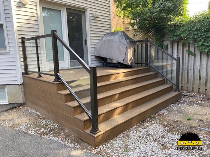 Composite deck with glass railing in Toronto