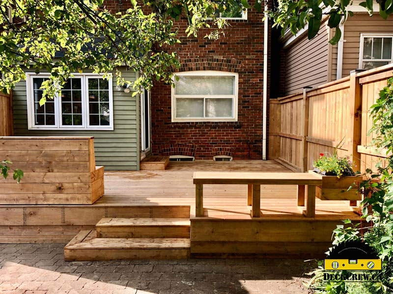 One of the gorgeous pressure-treated decks built by deckcrew.ca team