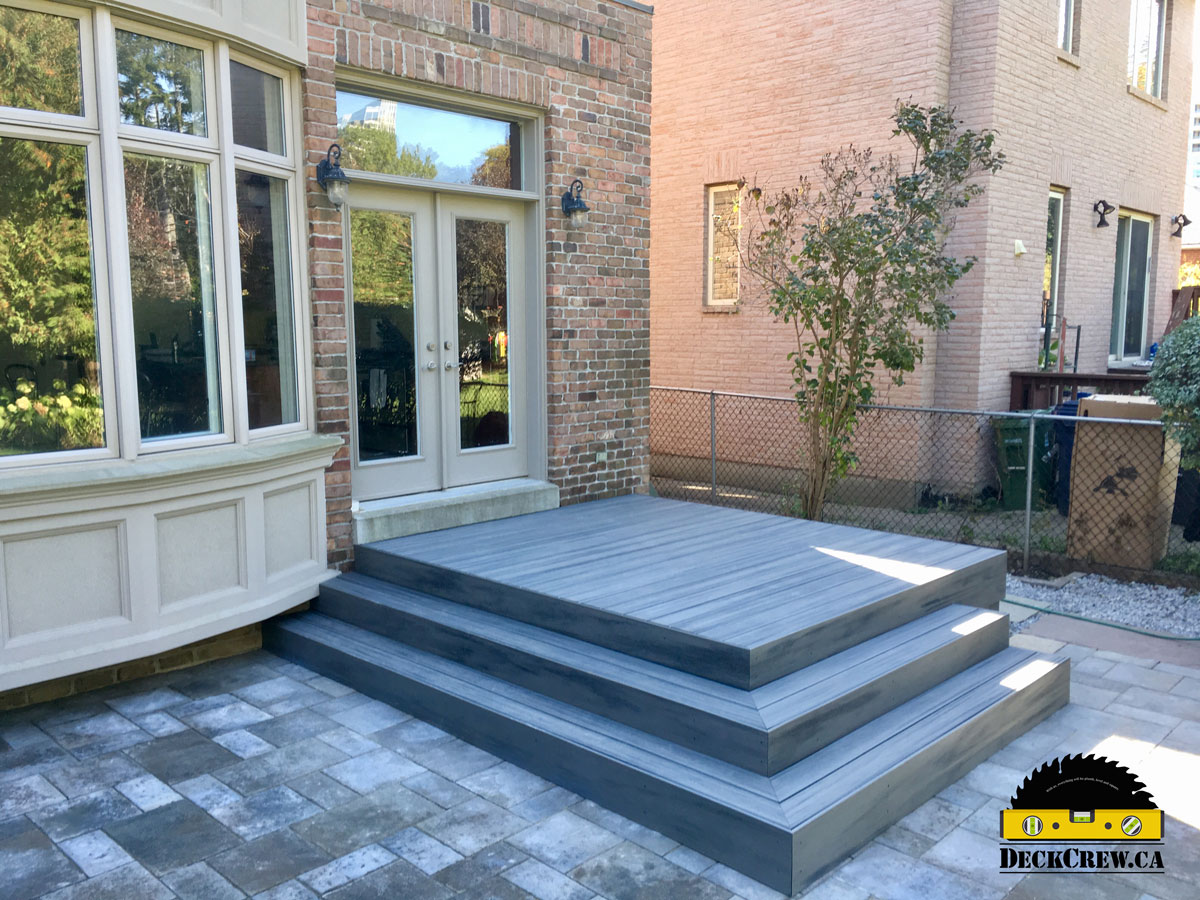 PVC deck in North York with modern low-maintenance decking and wide entry steps