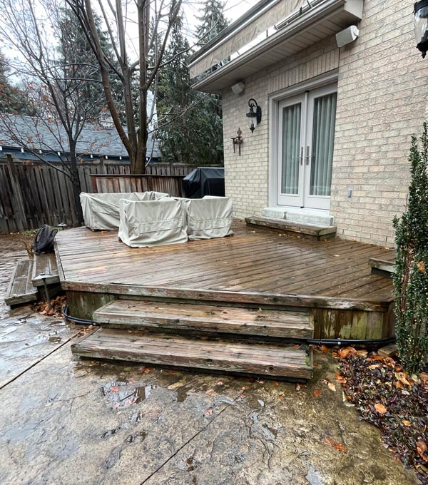 Old wooden deck with two stairs